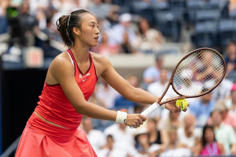 Qinwen,Zheng,Of,China,Serves,During,Quarterfinal,Round,Against,Aryna