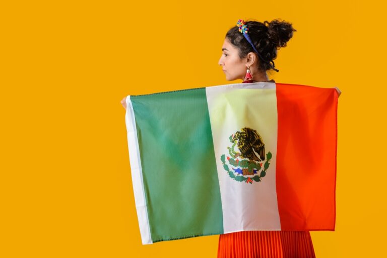 Young,Beautiful,Woman,With,Mexican,Flag,On,Color,Background