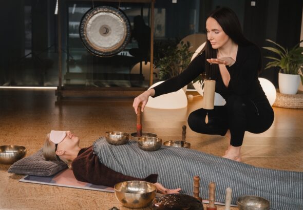 A,Young,Beautiful,Woman,Is,Doing,A,Massage,With,Singing