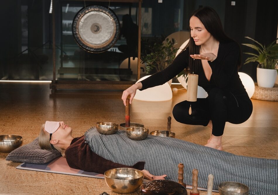 A,Young,Beautiful,Woman,Is,Doing,A,Massage,With,Singing